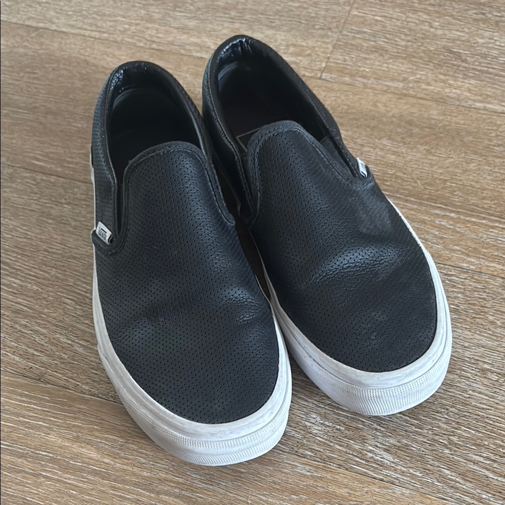Vans Black and White Slip-On Sneakers
